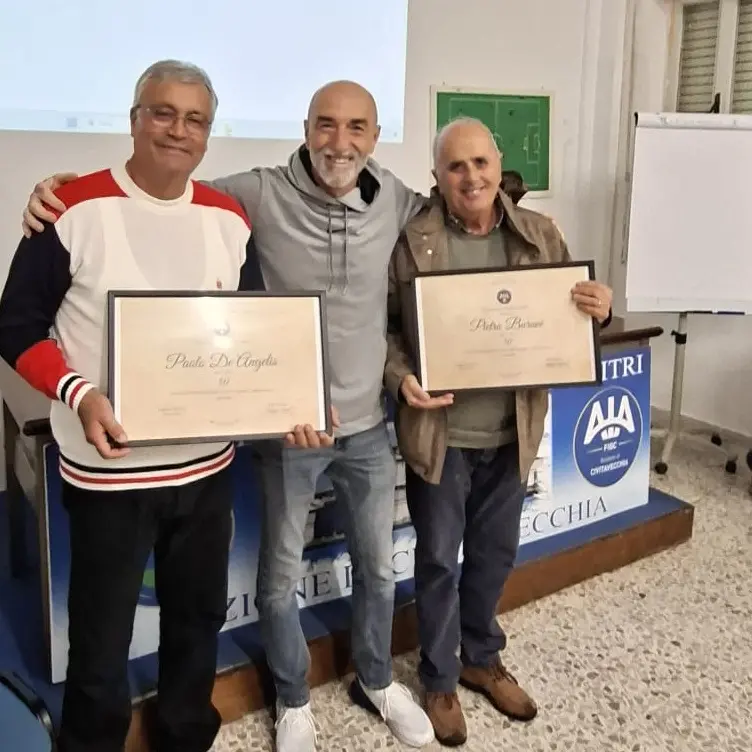 Pietro Burani e Paolo De Angelis premiati per aver raggiunto 50 anni di tessera
